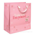 Beauty paper gift bag with polyester rope, pink print and nice design,OEM orders are welcome